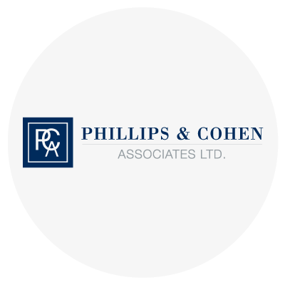 Phillips & Cohen Associates Ltd. logo on a white circular background.