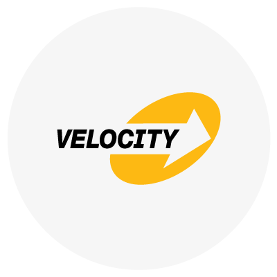 "VELOCITY" text with a white arrow inside an orange oval.