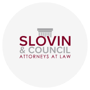 Logo of Slovin & Council Attorneys at Law with a stylized courthouse image above the text.